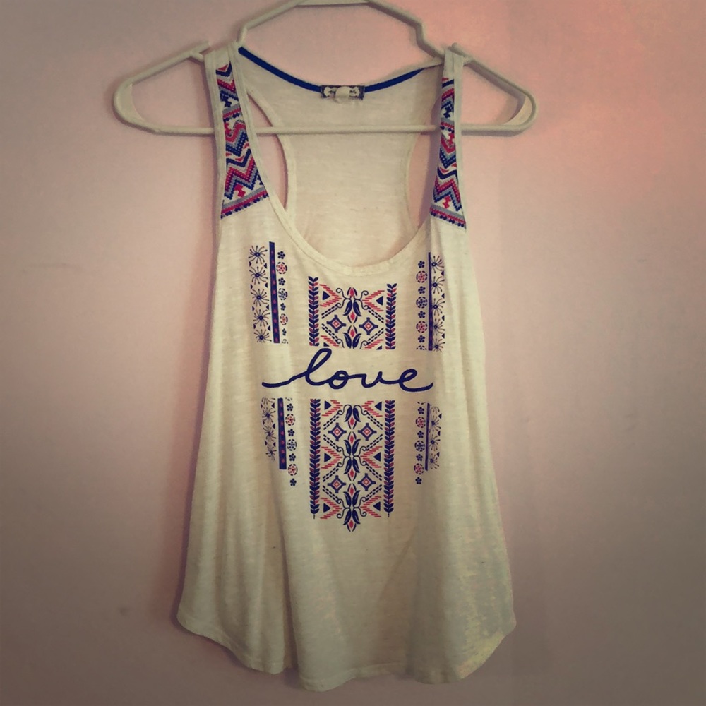 Cream colored love patterned tank top.